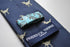 navy blue tie with t-rex dinosaur print design